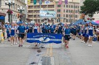 The Randolph High School marching band performs during the Battle of Flowers Parade April 24 in downtown San Antonio. The parade was held in conjunction with Fiesta San Antonio. Fiesta San Antonio, the city's 11-day historical celebration, began as a one-time parade in 1891 to honor the memory of the heroes of the Alamo and the Battle of San Jacinto. Over the past century, Fiesta has grown into a celebration of San Antonio's rich and diverse cultures. Military representatives from throughout Joint Base San Antonio participate each year in receptions, parades, pilgrimages and memorials. (U.S. Air Force photo by Johnny Saldivar)

