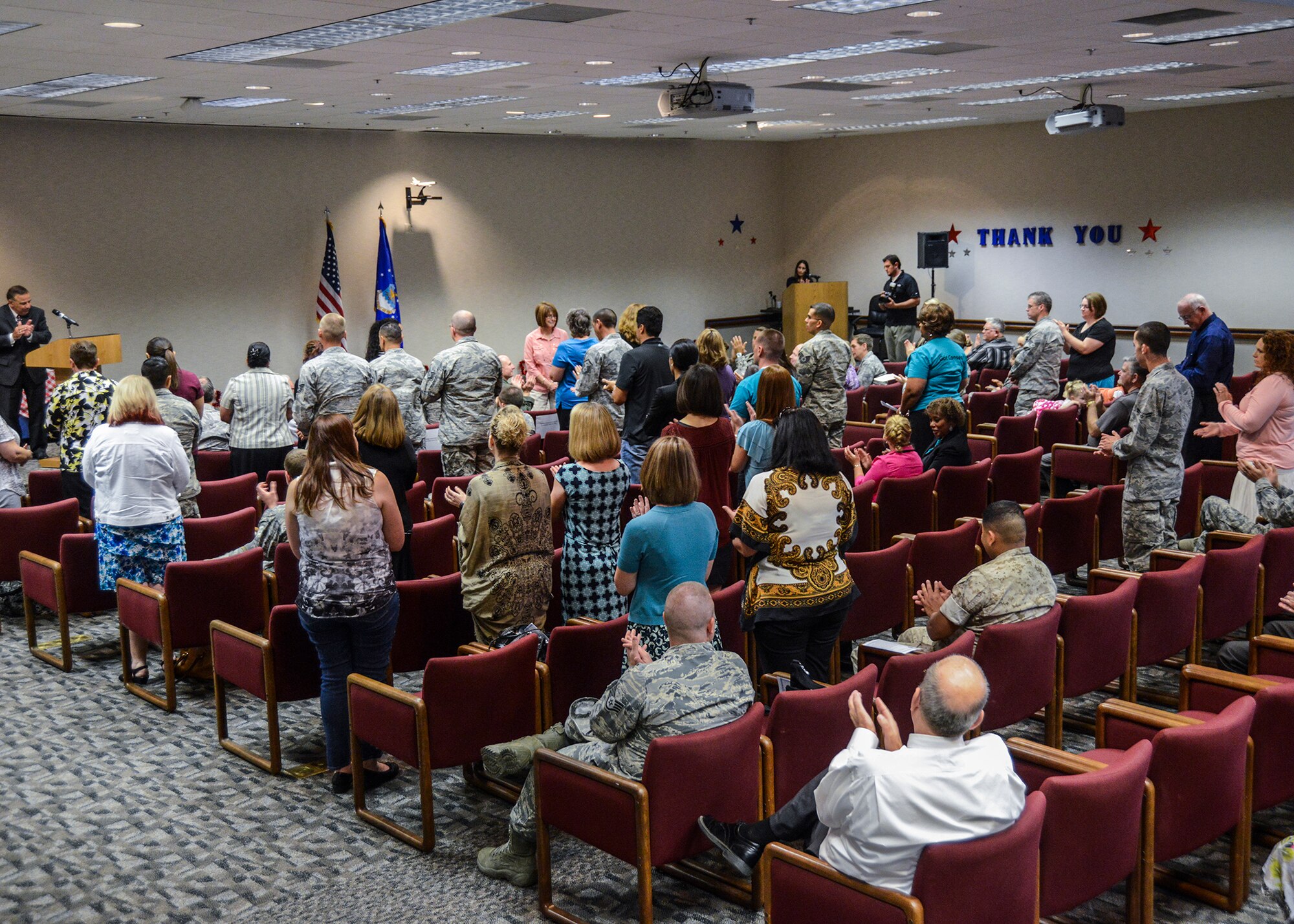 Alexander Kovras, 412th Force Support Squadron director, asked each volunteer in the room to stand up and be recognized for their service. The recognition ceremony took place April 28, in the Airman and Family Readiness Center. (U.S. Air Force photo by Rebecca Amber)