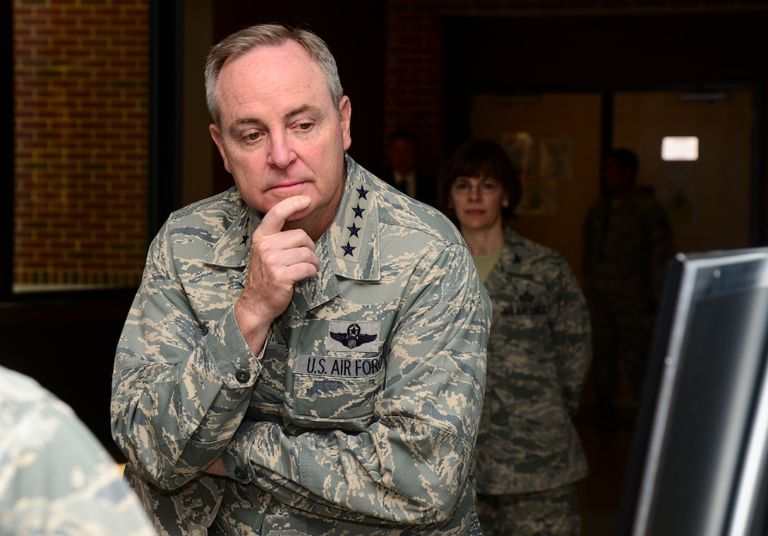 Chief of Staff of the U.S. Air Force, Gen. Mark A. Welsh III, receives a briefing at the 480th Intelligence, Reconnaissance, and Surveillance Wing at Langley Air Force Base, Va., April 27, 2015. Welsh was briefed on the developments and progress made throughout the ISR career field in recent years. (U.S. Air Force photo by Senior Airman Kayla Newman/Released)