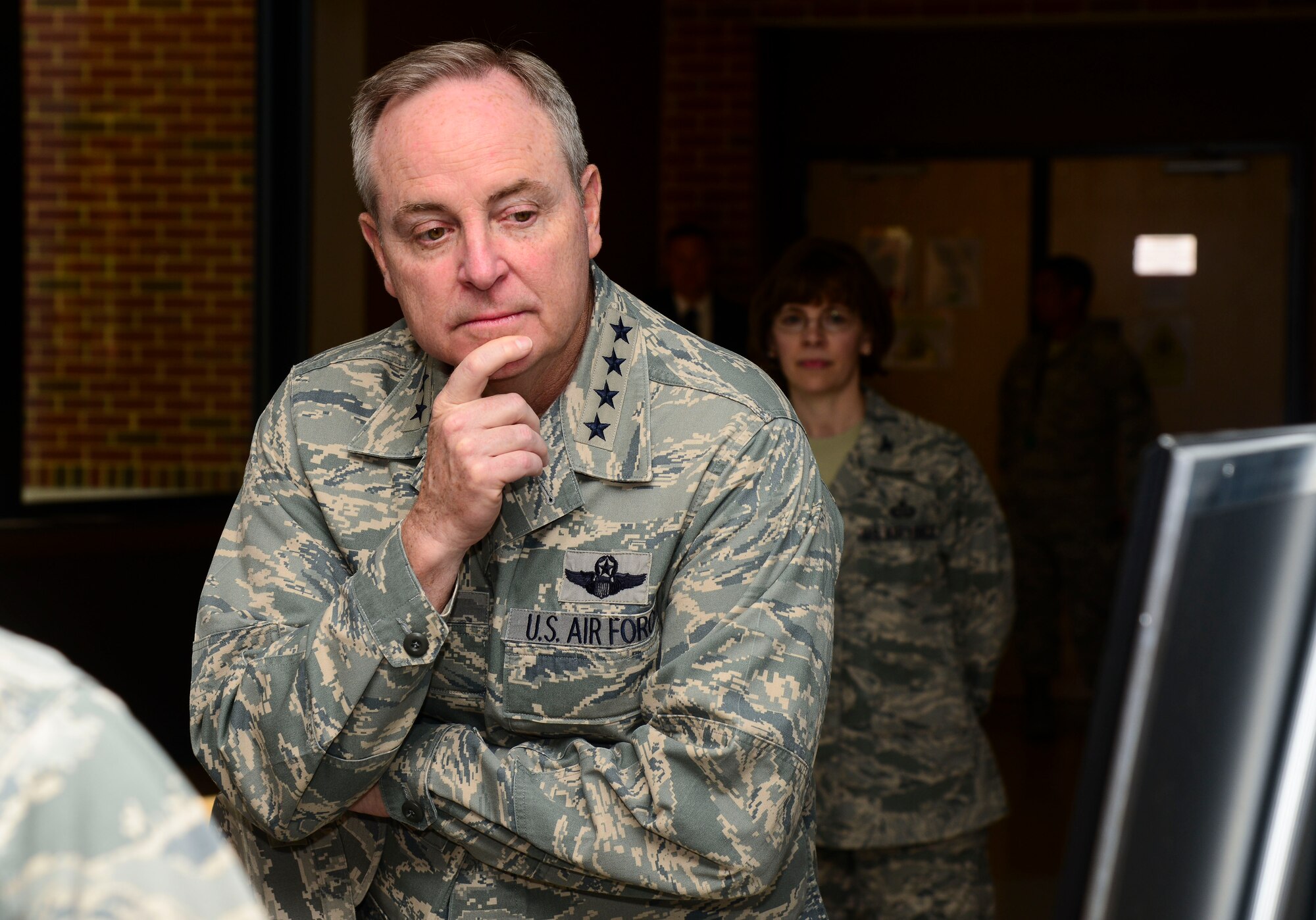 Chief of Staff of the U.S. Air Force, Gen. Mark A. Welsh III, receives a briefing at the 480th Intelligence, Reconnaissance, and Surveillance Wing at Langley Air Force Base, Va., April 27, 2015. Welsh was briefed on the developments and progress made throughout the ISR career field in recent years. (U.S. Air Force photo by Senior Airman Kayla Newman/Released)