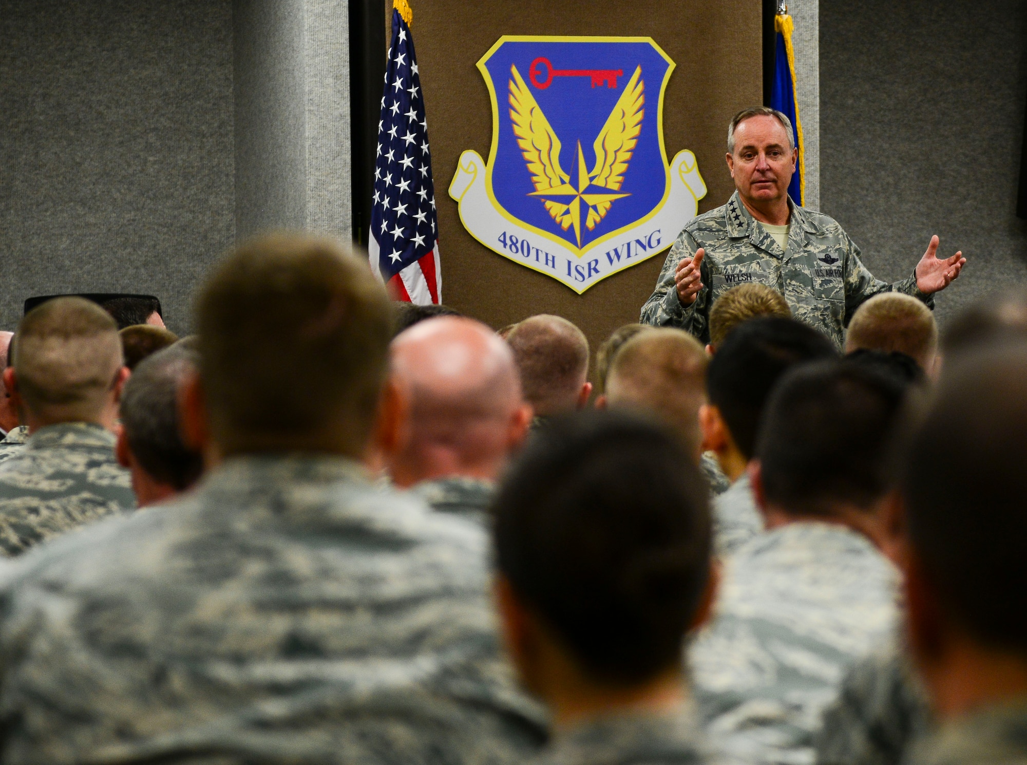 Chief of Staff of the U.S. Air Force, Gen. Mark A. Welsh III, visits with Airmen from the 480th Intelligence, Reconnaissance, and Surveillance Wing at Langley Air Force Base, Va., April 27, 2015. Welsh answered questions regarding manning, Airmen development and retirement plans. (U.S. Air Force photo by Senior Airman Kayla Newman/Released) (Photo was cropped and sharpened to emphasize subject.)