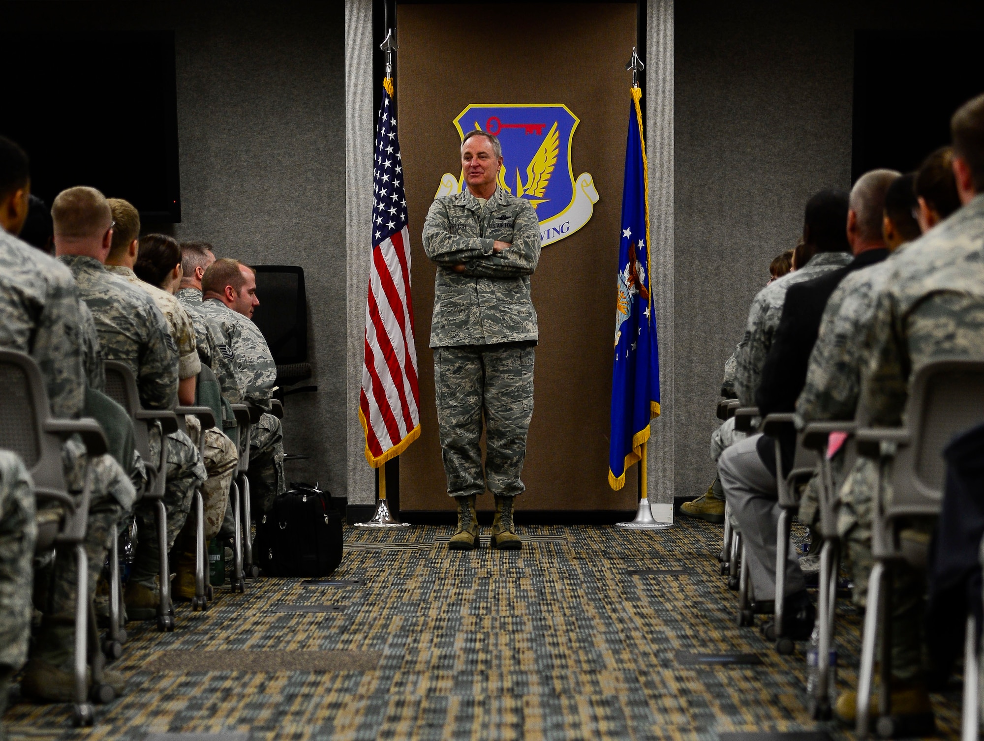 U.S. Air Force Chief of Staff Gen. Mark A. Welsh III, visits with Airmen from the 480th Intelligence, Reconnaissance, and Surveillance Wing at Langley Air Force Base, Va., April 27, 2015. Welsh answered questions regarding manning, Airmen development and retirement plans. (U.S. Air Force photo by Senior Airman Kayla Newman/Released) (Photo was cropped and sharpened to emphasize subject.)