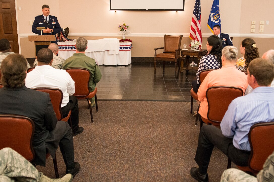 Family, friends and coworkers attend a retirement ceremony for U.S. Air Force Chief Master Sgt. Mark Traynham, April 25, 2015, Barksdale Air Force Base, La. Traynham is the Security Forces Manager assigned to the 307th Security Forces Squadron and is retiring from the Air Force Reserve after 33 years of service. (U.S. Air Force photo by Master Sgt. Greg Steele/Released)
