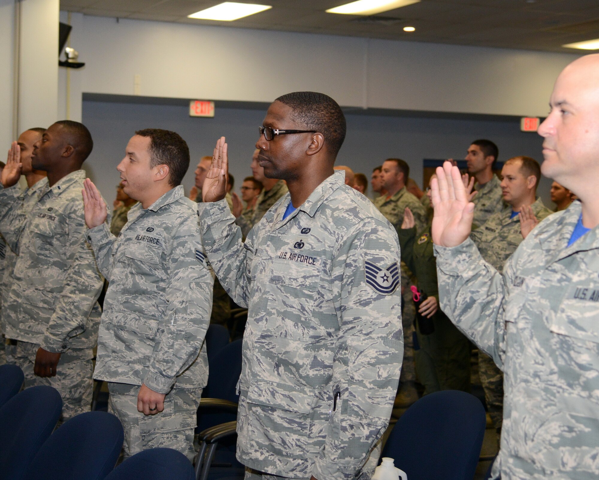 Airmen are sworn in at a mock trial April 17 at the Phillips Laboratory building. The mock trial was held as part of a Sexual Assault Awareness and Prevention Month series. About 150 Airmen turned out to serve as members of the mock panel deciding the fate of the accused. (Photo by Jamie Burnett)