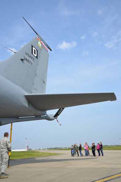 Spouses from the 100th Maintenance Group tour a KC-135 Stratotanker April 24, 2015, during the 100th MXG Spouses Appreciation Day event on RAF Mildenhall, England. The spouses were given a tour of workcenters within the 100th Operations Group and the 100th MXG to help show how their military spouses play a vital role in the mission of the base. (U.S. Air Force photo by Karen Abeyasekere/Released)