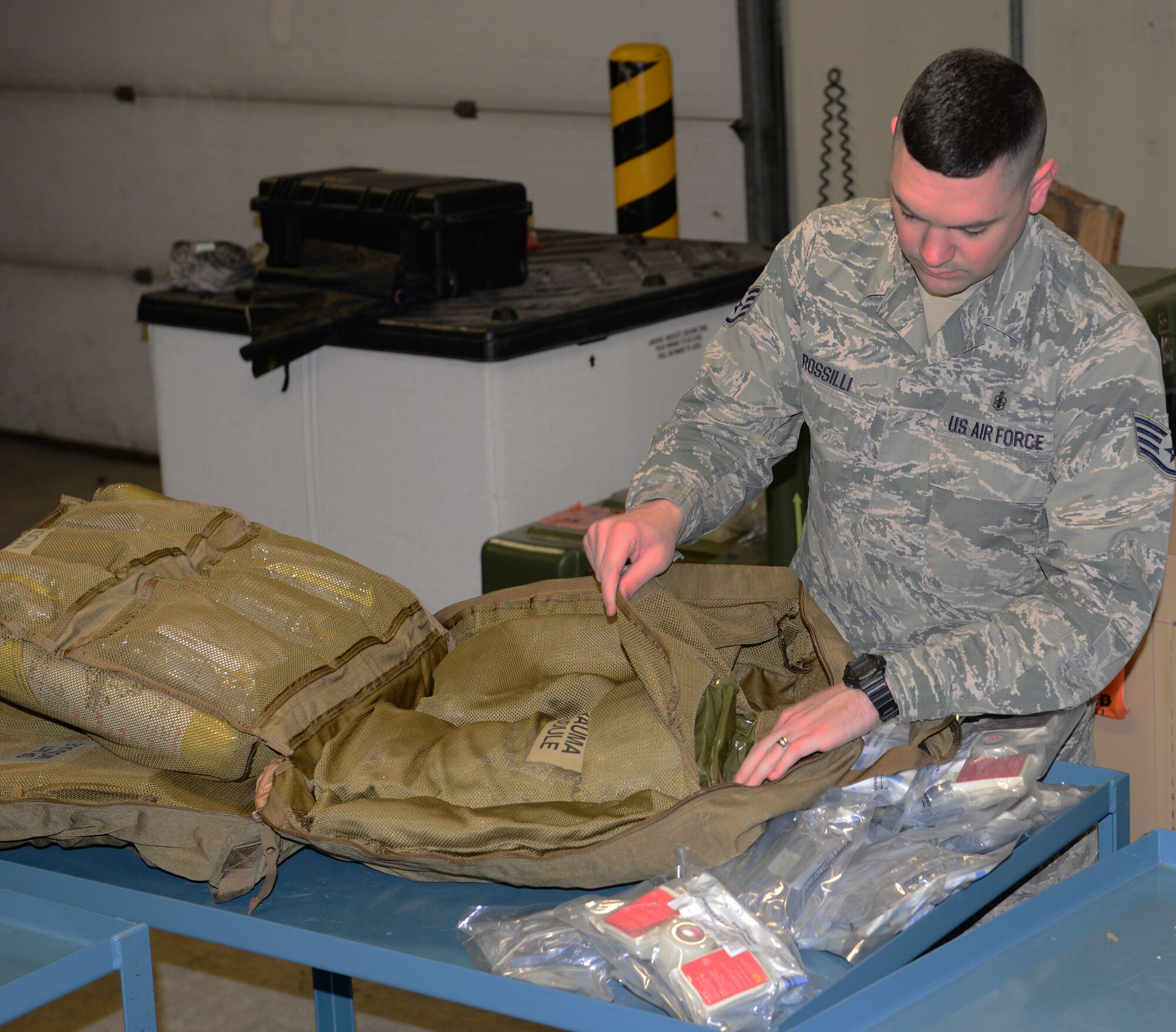 Staff Sgt. Joseph Rossilli, 51st Medical Support Squadron, packs a first-aid kit April 17, 2015, at Osan Air Base Republic of Korea. Rossilli was chosen as a Team Osan Spotlight award winner. Individuals who are chosen for this spotlight recognition are distinguished as consistent, superior performers within their squadrons. (U.S. Air Force photo by Staff Sgt. Benjamin Sutton/Released)