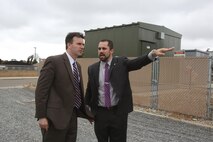 Joseph Bryan, Deputy Assistant Secretary of the Navy, Energy , speaks with Mick Wasco, Marine Corps Air Station Miramar Energy Manager, while viewing the the landfill gas facility aboard Marine Corps Air Station Miramar, California April 24. The visit including a presentation about the station's energy capabilities and goals. (U.S. Marine Corps photo by Sgt. Lillian Stephens/Released)