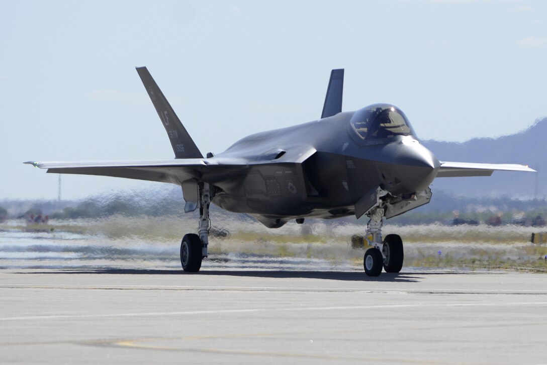 Brig. Gen. Scott Pleus, the 56th Fighter Wing commander, lands the flagship F-35 Lightning ll at Luke Air Force Base, Ariz., April 28, 2015. The flagship's arrival coincides with the start of Luke’s F-35 student pilot training, which begins in May. Luke now has 20 U.S. F-35s and two from the Royal Australian Air Force. (U.S. Air Force photo/Senior Airman Devante Williams)