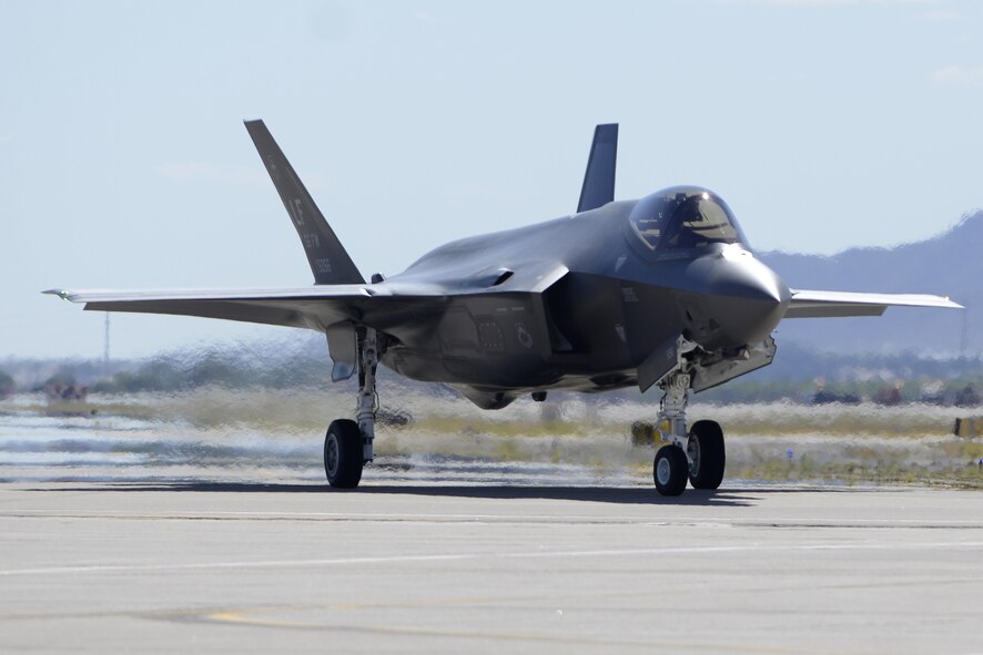 Brig. Gen. Scott Pleus, the 56th Fighter Wing commander, lands the flagship F-35 Lightning ll at Luke Air Force Base, Ariz., April 28, 2015. The flagship's arrival coincides with the start of Luke’s F-35 student pilot training, which begins in May. Luke now has 20 U.S. F-35s and two from the Royal Australian Air Force. (U.S. Air Force photo/Senior Airman Devante Williams)