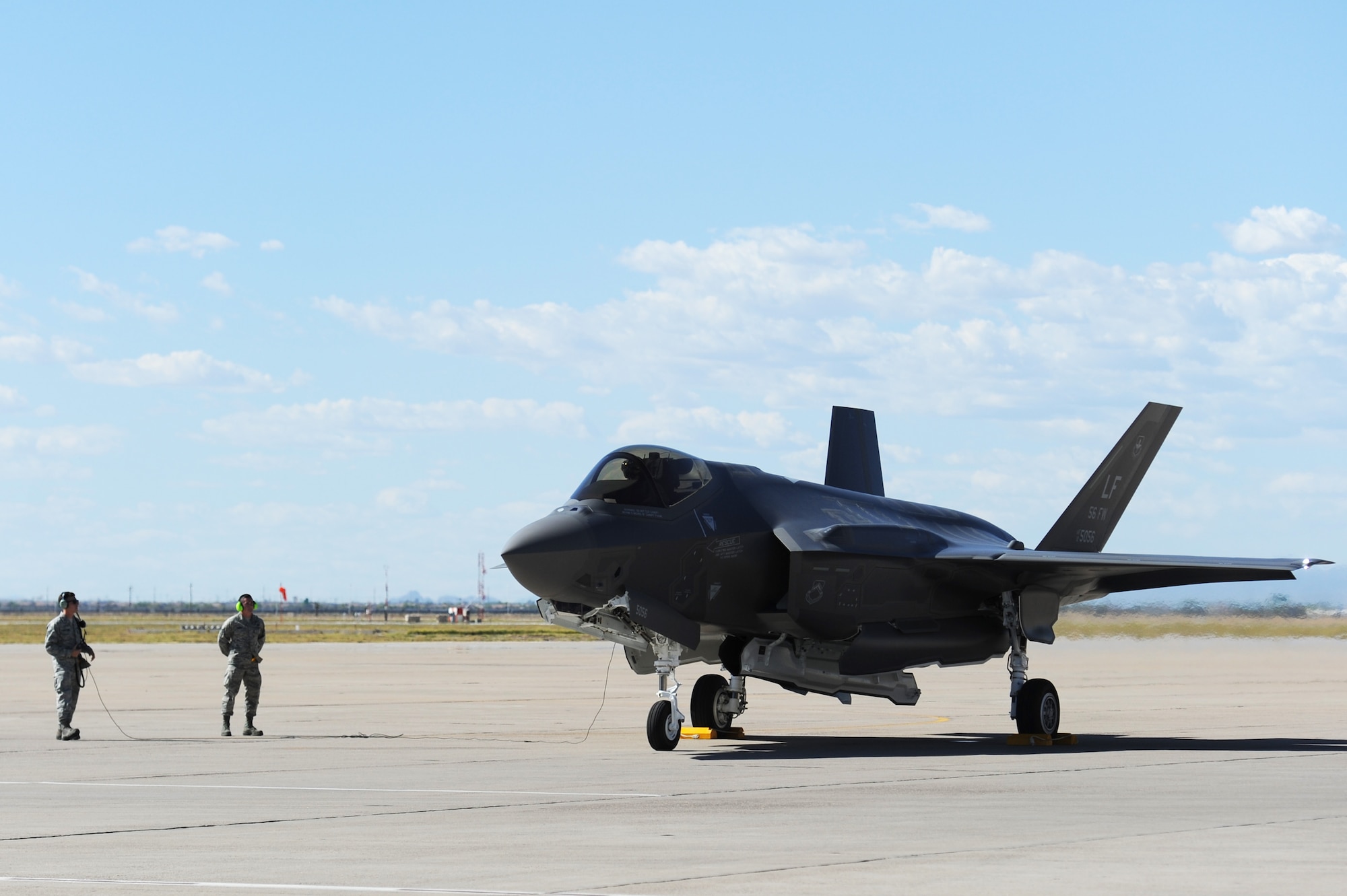 Brig. Gen. Scott Pleus, the 56th Fighter Wing commander, lands the flagship F-35 Lightning ll at Luke Air Force Base, Ariz., April 28, 2015. The flagship's arrival coincides with the start of Luke’s F-35 student pilot training, which begins in May. Luke now has 20 U.S. F-35s and two from the Royal Australian Air Force. (U.S. Air Force photo/Senior Airman Devante Williams)
