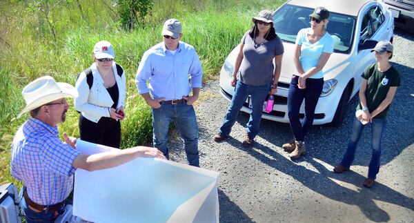 Learning about a commercial biodiversity mitigation site in Galt, California, an interagency team visits a 495-acre project operated by Westervelt Ecological Services. From left to right are Matt Gause, Westervelt senior ecologist; Sophie Menard, University of Versailles, France; Travis Hemmen, Westervelt market development specialist; Melissa France and Kaitlyn Pascus, U.S. Army Corps of Engineers Sacramento District regulatory specialists; and Ali Dunn, California Department of Fish and Wildlife.