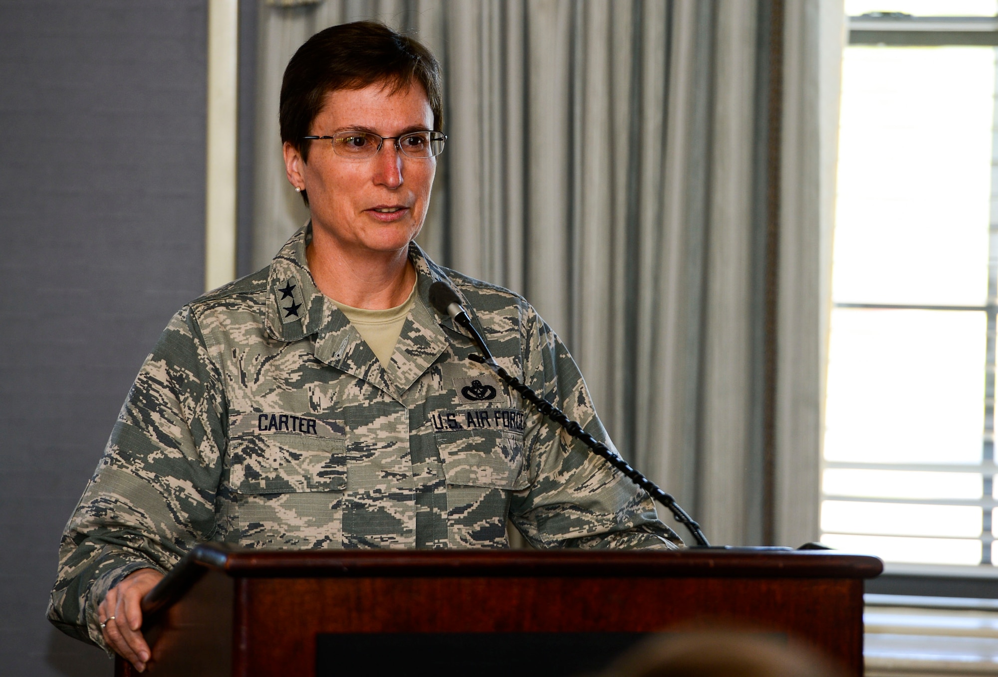 Maj. Gen. Theresa Carter, Air Force Installation and Mission Support Center commander, provides remarks during the AFIMSC Detachment 8 assumption of command at Joint Base Langley-Eustis, Va., April 24, 2015. Col. Russell Hula assumed command of the newly-formed detachment. (U.S. Air Force photo/Senior Airman Kayla Newman/Released)