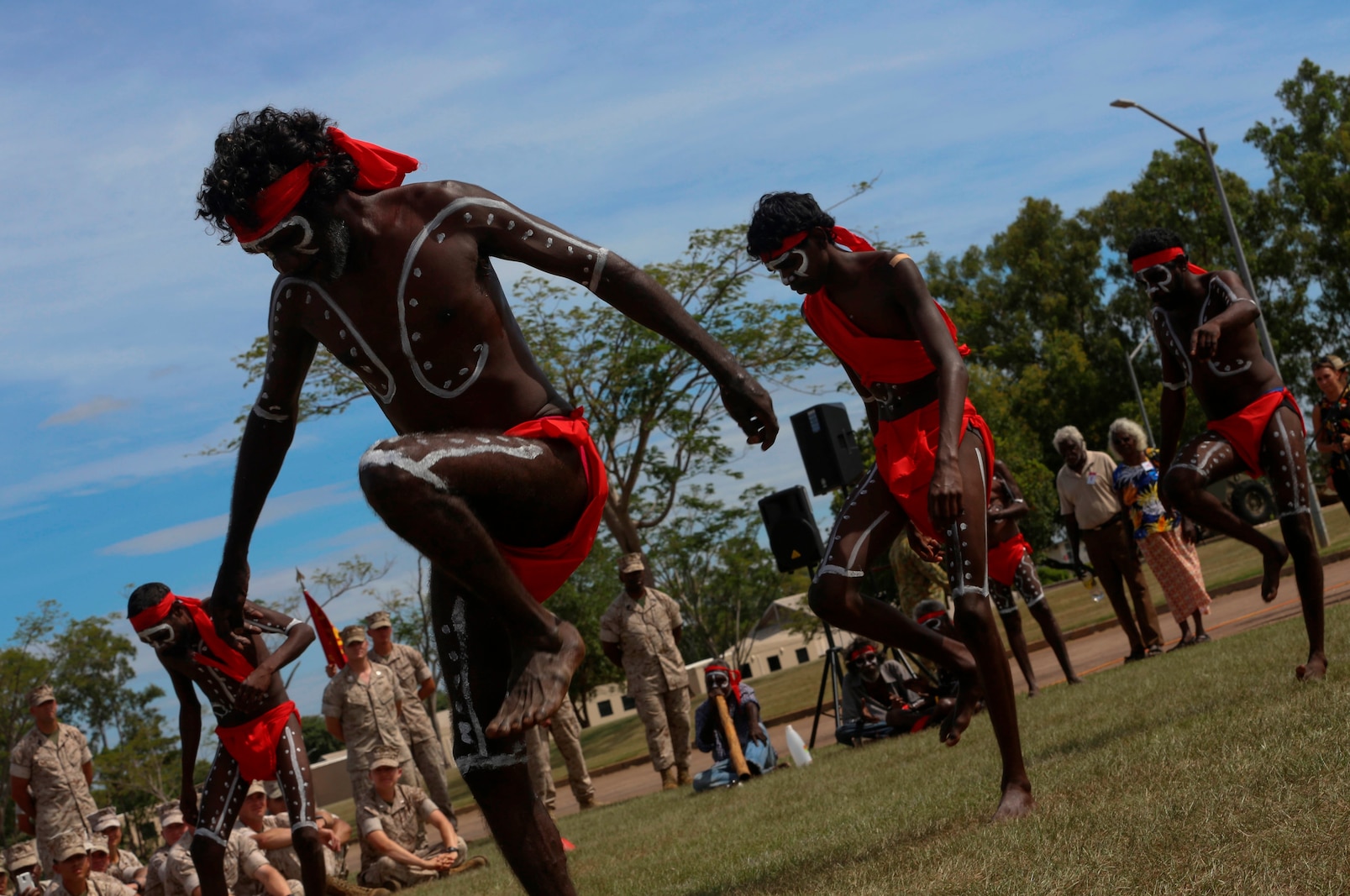 Aboriginal dancers perform for U.S. Marines with Marine Rotational Force – Darwin during a “Welcome to Country” ceremony April 22 at Robertson Barracks, Palmerston, Australia. Brigadier Mick Ryan, commander, 1st Brigade, Australian Army, Australian Defence Force, spoke about the relationship between the Marines and Australians during the MRF-D deployment, and introduced Marines to aboriginal culture by inviting the Kenbi Dancers to conduct a welcoming performance.  MRF-D is the deployment of U.S. Marines to Darwin and the Northern Territory, for approximately six months at a time, where they will conduct exercises and training on a rotational basis with the ADF. (U.S. Marine Corps photo by Lance Cpl. Kathryn Howard/Released)