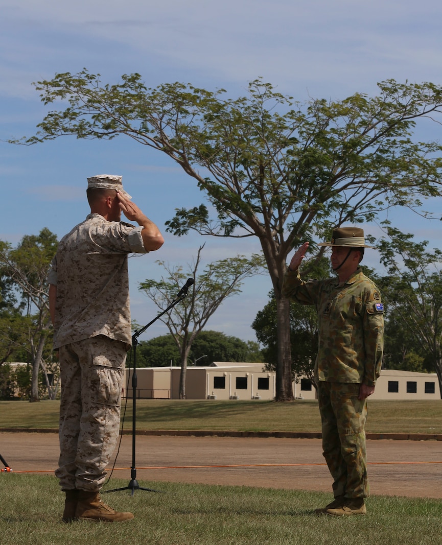 Lieutenant Colonel Eric J. Dougherty, commanding officer, Marine Rotational Force – Darwin, salutes Brigadier Mick Ryan, commander, 1st Brigade, Australian Army, Australian Defence Force, during a “Welcome to Country” ceremony April 22 at Robertson Barracks, Palmerston, Australia. Ryan spoke about the relationship between the Marines and Australians during the MRF-D deployment, and introduced Marines to aboriginal culture by inviting the Kenbi Dancers to conduct a welcoming performance. MRF-D is the deployment of U.S. Marines to Darwin and the Northern Territory, for approximately six months at a time, where they will conduct exercises and training on a rotational basis with the ADF. (U.S. Marine Corps photo by Lance Cpl. Kathryn Howard/Released)