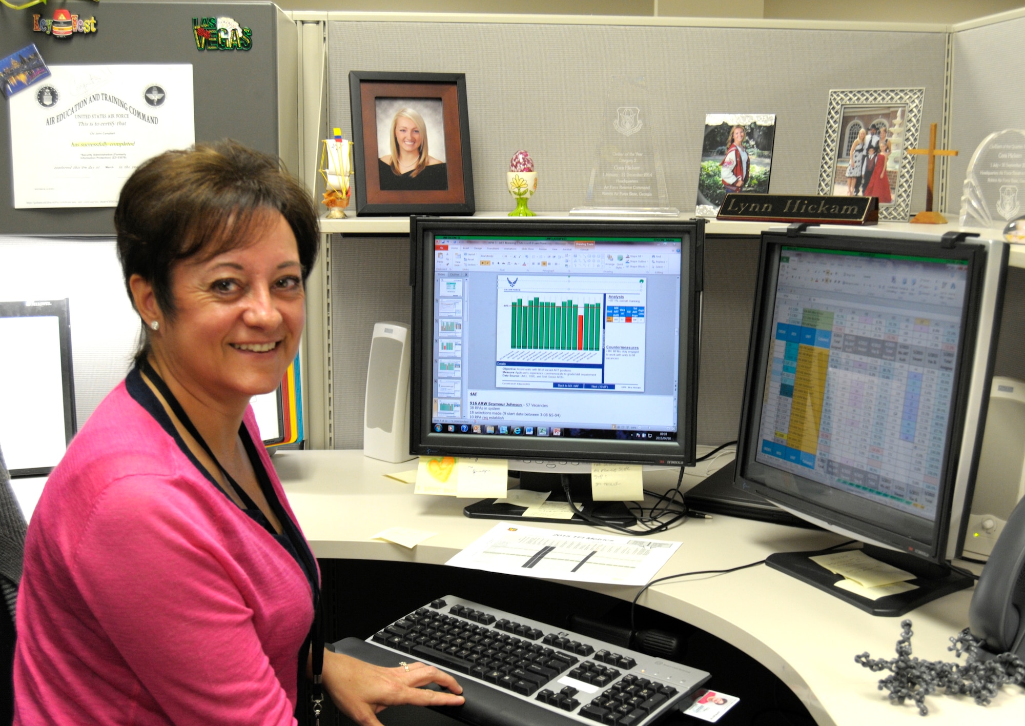 Lynn Hickam, Air Force Reserve Command logistics training manager, sits at her desk on Robins Air Force Base, Ga., April 29, 2015. Hickam helps her units get situated for school, ensures compliance with training and assists with manning. (U.S. Air Force photo by Staff Sgt. Sarah Hanson/RELEASED)