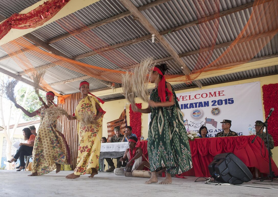 Local barangay residents perform during exercise Balikatan 2015’s San Rafael High School ribbon cutting ceremony to celebrate the completed construction of a two-classroom building alongside U.S., Philippine and Australian forces in San Rafael, Palawan, Philippines, April 28. Construction of the BK15 humanitarian civic assistance projects started this past March with the Armed Forces of the Philippines, U.S. forces and Australian forces working shoulder-to-shoulder to construct a two-classroom building for Santa Lourdes National High School, Sabang Elementary School, San Rafael High School and San Rafael Elementary School. This year marks the 31st iteration of the exercise, which is an annual Philippine-U.S. bilateral military training exercise and humanitarian civic assistance engagement.
