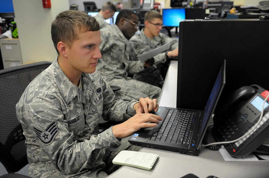 U.S. Staff Sgt. Jack Shultz, 18th Communications Squadron client systems journeyman, troubleshoots a connectivity issue on a laptop as part of his training at Kadena Air Base, Japan, March 5, 2015. Schultz won the 2014 Air Force Information Dominance Outstanding Client Systems Airman of the Year award for his outstanding performance at Kadena and while deployed.