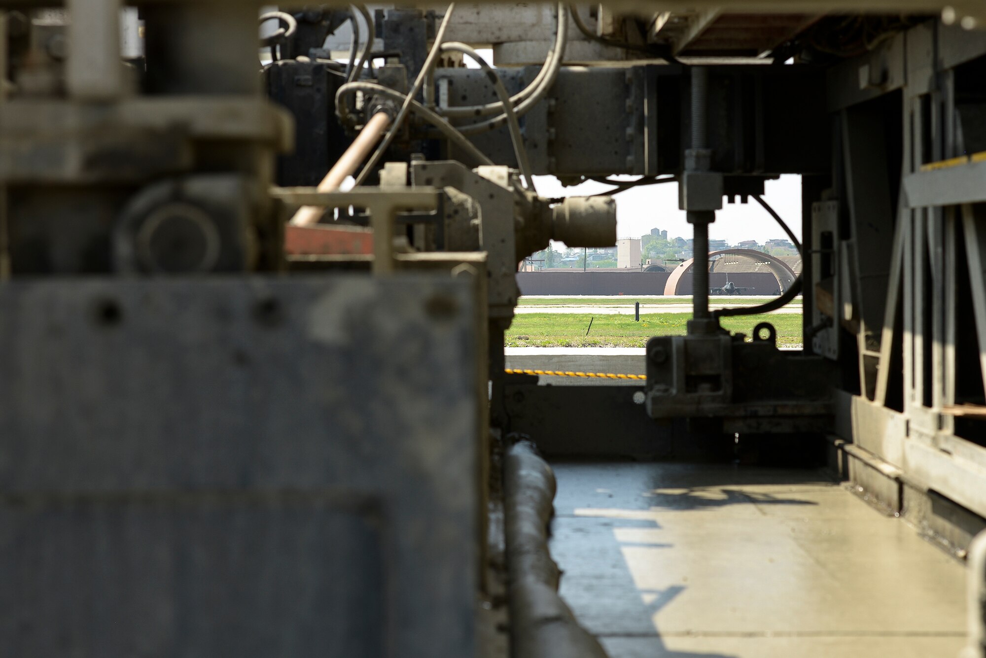 Cement is laid down during construction on the second runway April 30, 2015, at Osan Air Base, Republic of Korea. The runway will span over 9,000 feet. (U.S. Air Force photo by Staff Sgt. Jake Barreiro/Released)