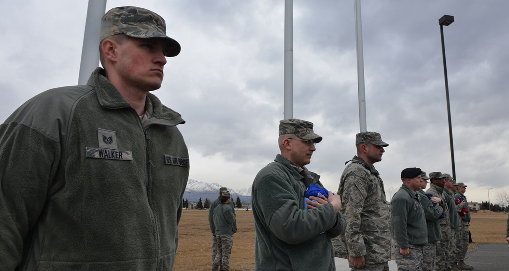 Tech. Sgt. Wesley Walker, a conventional maintenance production supervisor at the 354th Maintenance Squadron at Eielson Air Force Base, and his cousin Tech. Sgt. Steven Walker, noncommissioned officer in charge of the network control center at 354th Communications Squadron, also at Eielson, practice as part of the honor guard April 14 for their class at the noncommissioned officer academy at Joint Base Elmendorf-Richardson.. Participation in regular ceremonies is one of the many ways the professional military education center preserves professionalism in the force. (U.S. Air Force photo/Airman 1st Class Kyle Johnson)