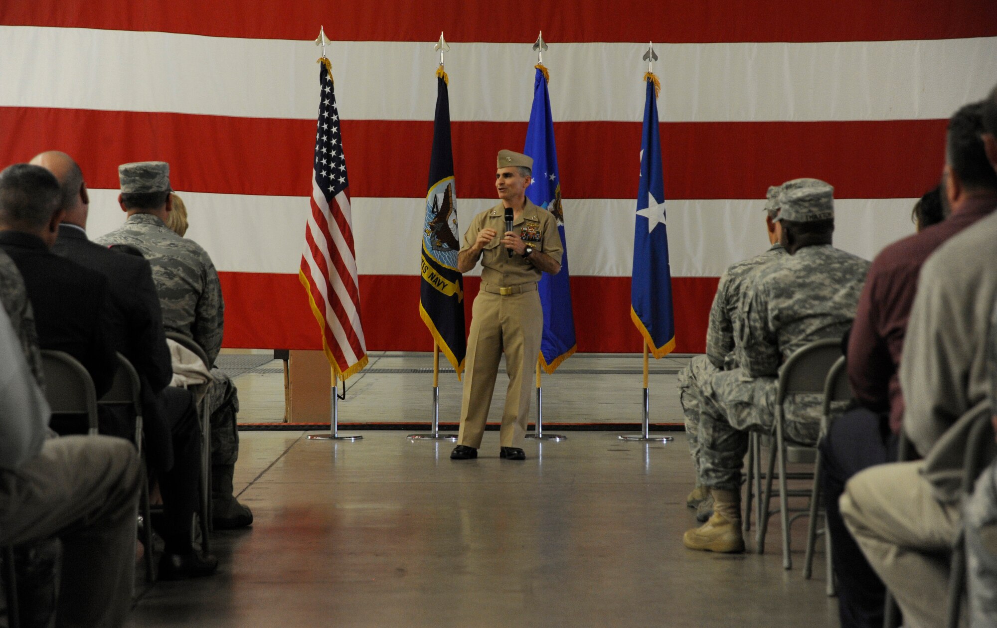 U.S. Navy Rear Adm. Brian B. Brown, deputy commander, Joint Functional Component Command for Space, speaks to members attending his promotion ceremony, April 29, 2015, Vandenberg Air Force Base, Calif. Family members and guests from VAFB were present for the ceremony. (U.S. Air Force Photo by Airman 1st Class Robert J. Volio/Released)