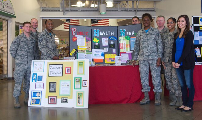 Members of the 366th Aerospace Medicine Squadron Public Health Flight pose for a photo at the Base Exchange at Mountain Home Air Force Base, Idaho on April 10, 2015. The Public Health flight set up an information booth in support of the American Public Health Association. (U.S. Air Force photo by 2nd LT. Kip Sumner/RELEASED) 