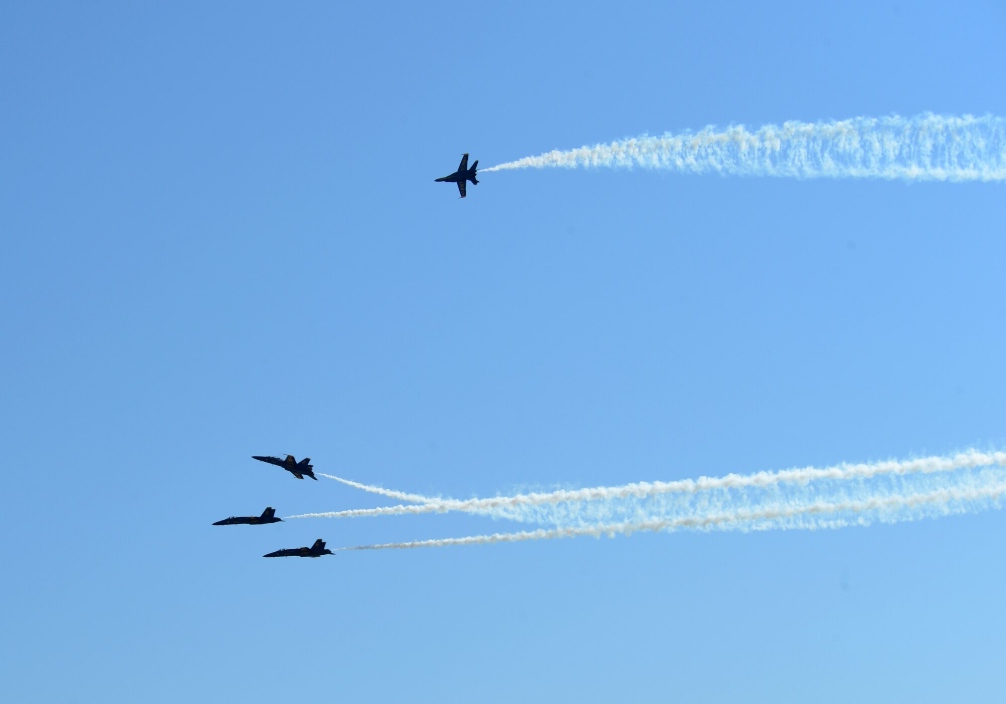 The U.S. Navy Flight Demonstration Team Blue Angels F/A-18 Hornets practice an aerial maneuver for the Defenders of Liberty Air Show on Barksdale Air Force Base, Louisiana, April 30, 2015. The mission of the Blue Angels is to showcase the pride and professionalism of the United States Navy and Marine Corps by inspiring a culture of excellence and service to country through flight demonstrations and community outreach. (U.S. Air Force photo/Senior Airman Benjamin Gonsier)