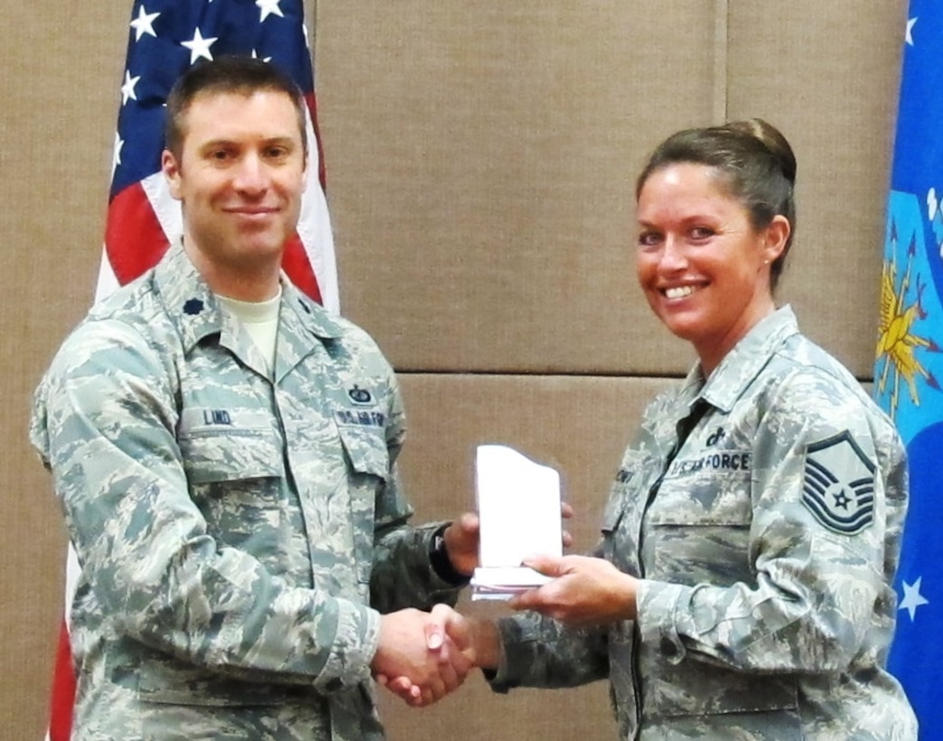 MSgt Alyson Jones received the Paul Shartle Musician of the Quarter award for the Band of Flight, 3rd quarter, 2014.