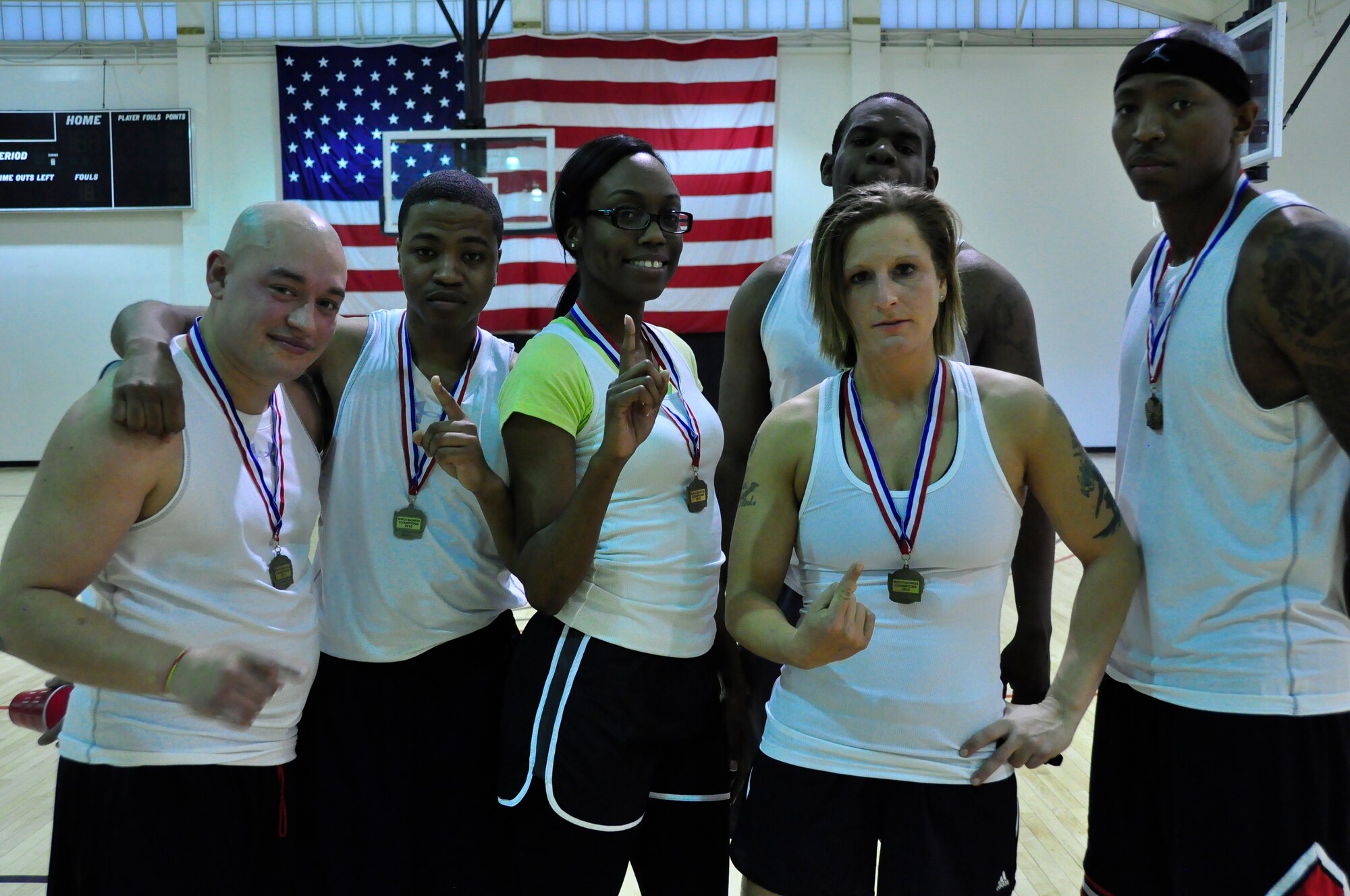 The 514th SFS team poses after defeating the 514th AMW in
the 2nd Annual Basketball tournament March 21 (US Air Force photo/Airman 1st Class Terrence Clyburne)