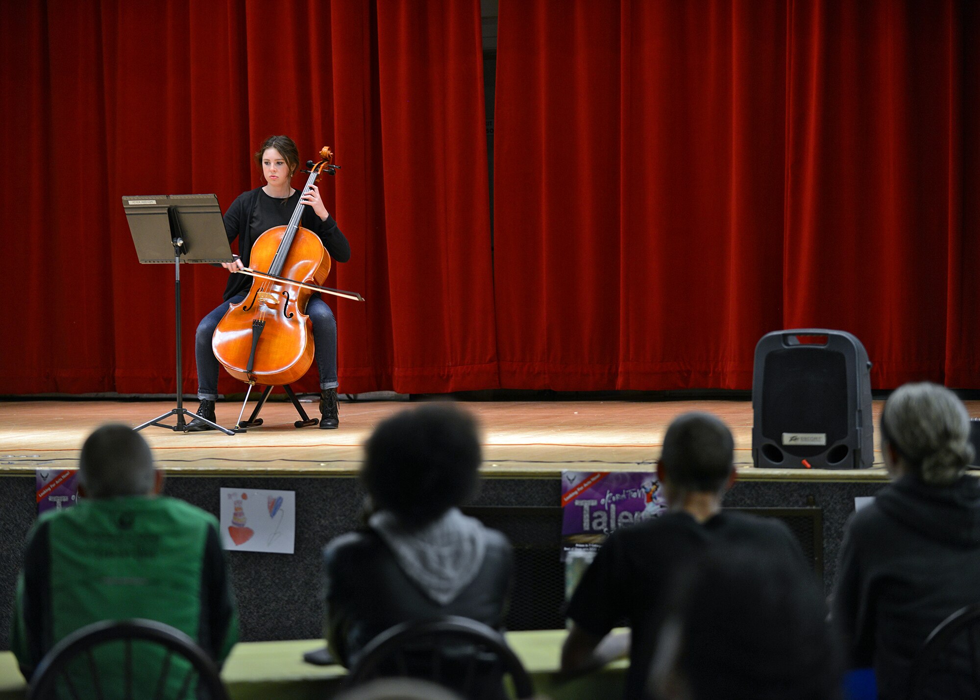 Piper Meisler, dependent, plays the cello during this year’s “Edwards got Talent” event at the Oasis Community Center which was held April 24. Meisler placed second in the talent competition. The event was hosted by Family Advocacy and the 412th Medical Group Booster Club to raise awareness during Child Abuse Prevention Month. (U.S. Air Force photo by Jet Fabara)