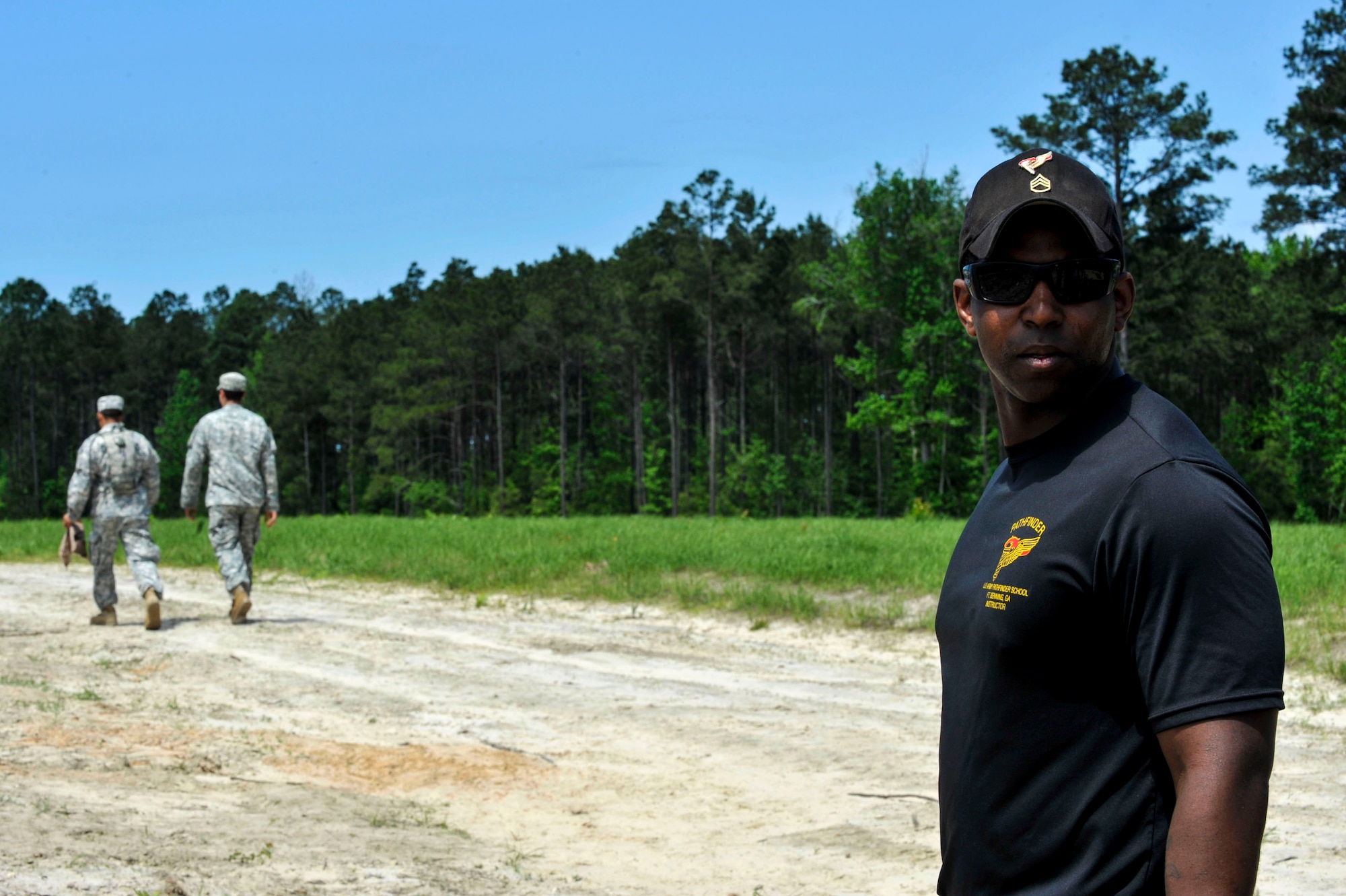 Staff Sgt.  Jeremy Sizemore, a 1st Battalion 507th Parachute Infantry Regiment Pathfinder instructor, prepares to initiate a drop zone April 22, 2015, near Ft. Polk, La. Sizemore is the primary instructor on teaching sling loads, the first stage of the pathfinder course. (U. S. Air Force photo by Senior Airman Stephanie Serrano)