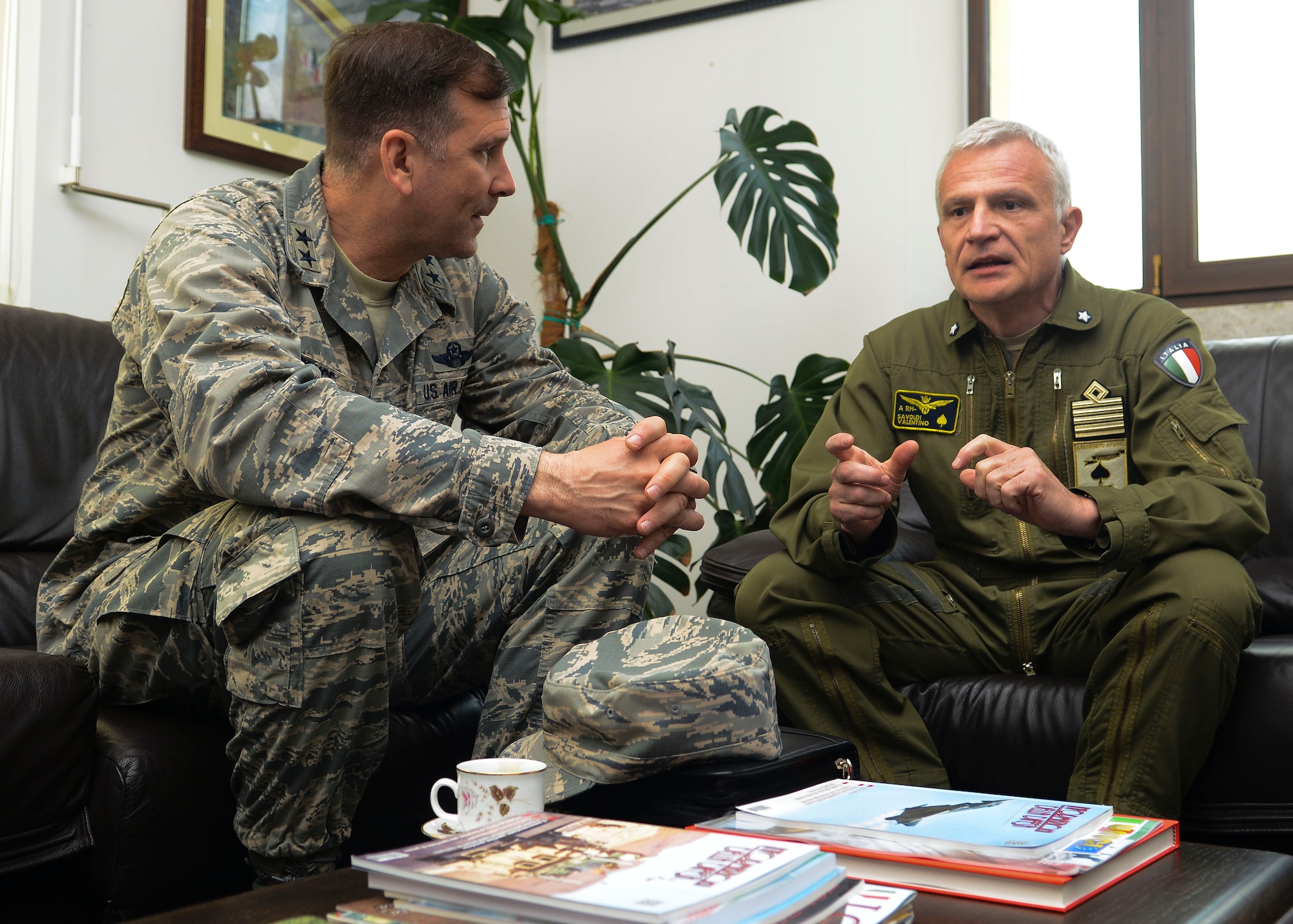 From left, U.S. Air Force Maj. Gen. Christopher Bence, 3rd Air Force vice commander, meets with Col. Valentino Savoldi, the Italian base commander, during a visit April 29, 2015, to Aviano Air Base, Italy. Bence and Savoldi discussed the thriving partnership between American and Italian forces in Italy. (U.S. Air Force photo by Senior Airman Austin Harvill/Released)