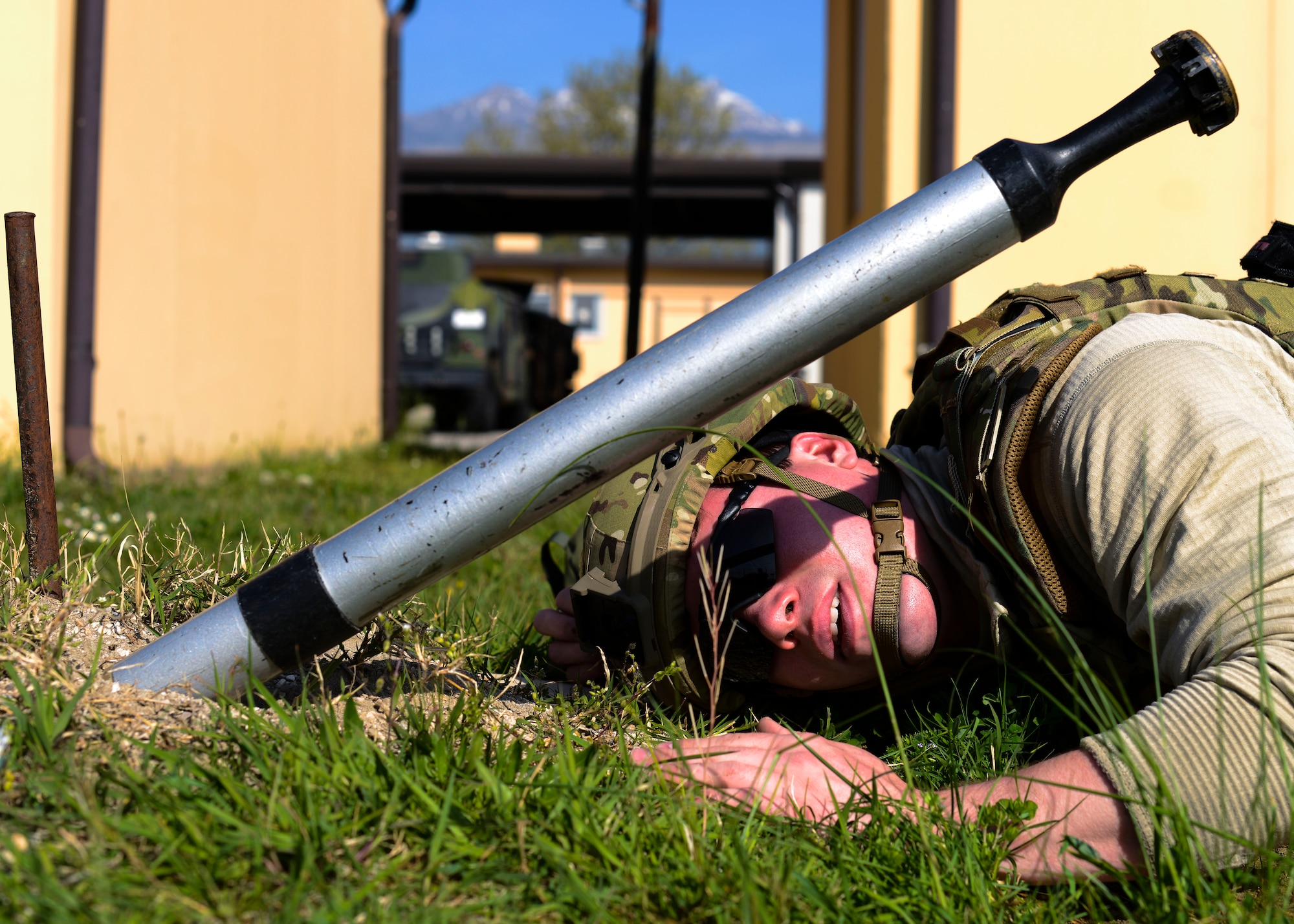 U.S. Air Force Senior Airman Josiah Hamernick, 31st Civil Engineer Squadron explosive ordnance disposal apprentice, examines a disarmed missile during training, April 22, 2015, at Aviano Air Base, Italy. Airmen in EOD look for words, designs, dimensions and other markings on ordnance to properly identify them before removal. (U.S. Air Force photo by Senior Airman Austin Harvill/Released)