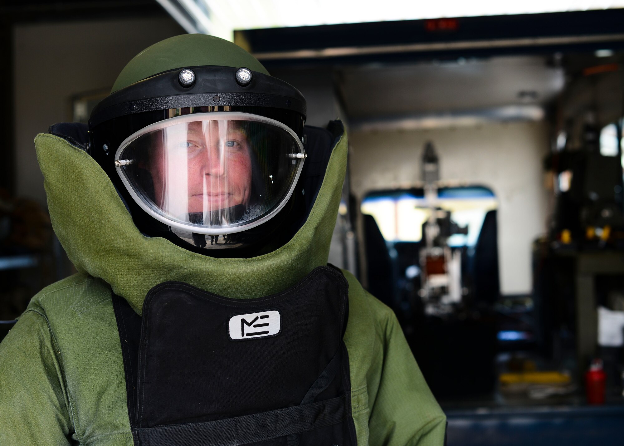 U.S. Air Force Tech. Sgt. Lawrence Miller, 31st Civil Engineer Squadron explosive ordnance disposal training NCO in charge, dons an EOD 9 Bomb Suit, April 22, 2015, at Aviano Air Base, Italy. The suit consists of numerous layers of Kevlar, plastic and foam that protect the wearer’s organs and prevent any spinal damage from the force of the blast. (U.S. Air Force photo by Senior Airman Austin Harvill/Released)