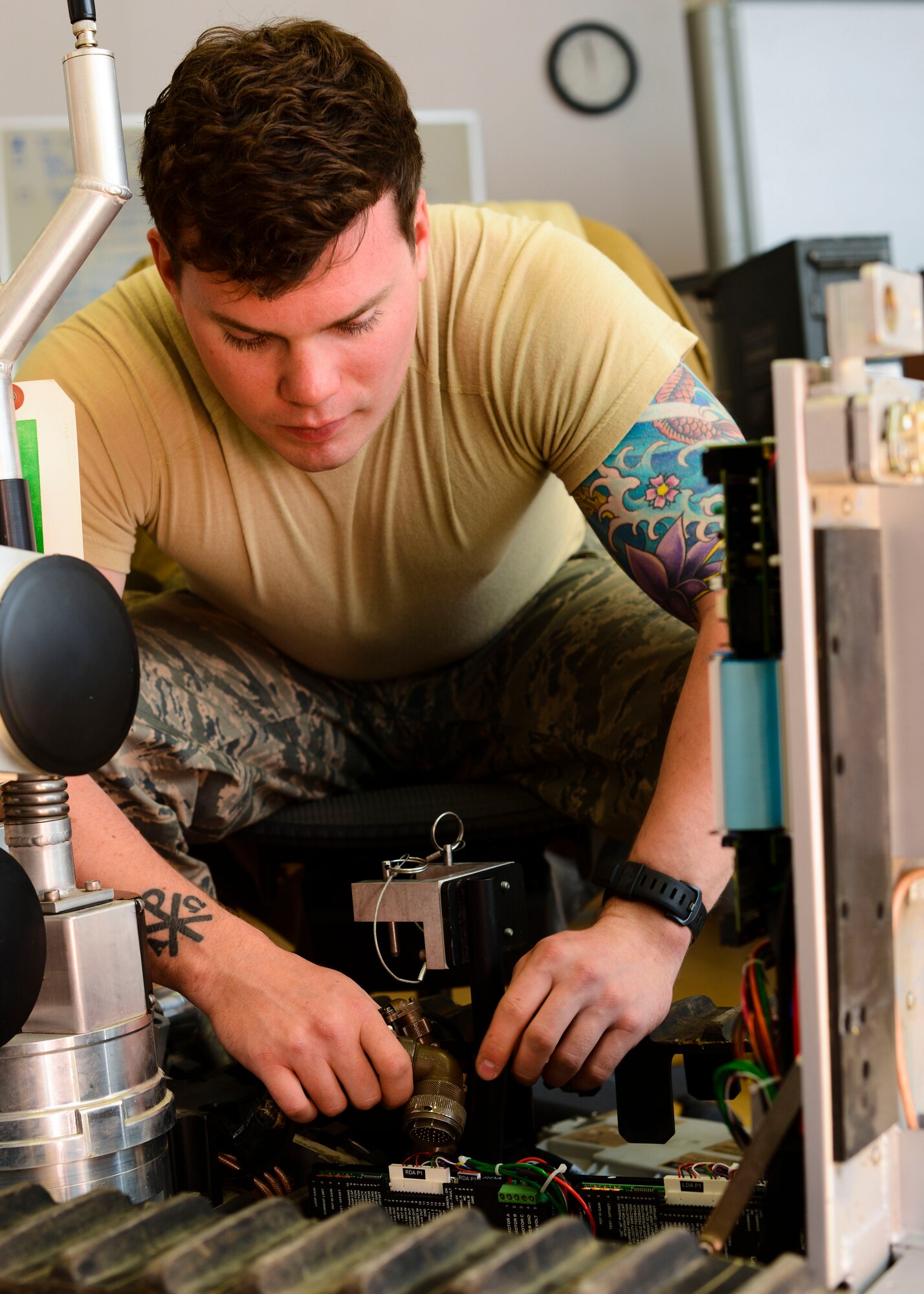 U.S. Air Force Senior Airman Josiah Hamernick, 31st Civil Engineer Squadron explosive ordnance disposal apprentice, checks connections on a bomb disposal robot, April 22, 2015, at Aviano Air Base, Italy. Ordnance disposal requires steady hands and meticulous attention to detail, as any wrong move could be fatal. (U.S. Air Force photo by Senior Airman Austin Harvill/Released)
