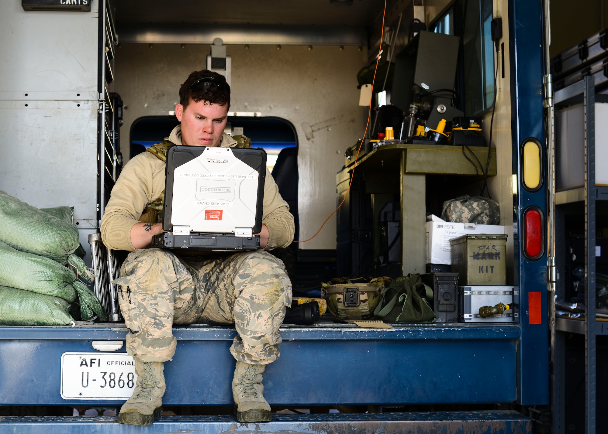 U.S. Air Force Senior Airman Josiah Hamernick, 31st Civil Engineer Squadron explosive ordnance disposal apprentice, identifies ordnance using the automated explosive ordnance disposal publication system during training, April 22, 2015, at Aviano Air Base, Italy. The AEODPS contains thousands of weapons, explosives, aircraft parts and other items technicians may encounter on a mission. (U.S. Air Force photo by Senior Airman Austin Harvill/Released)