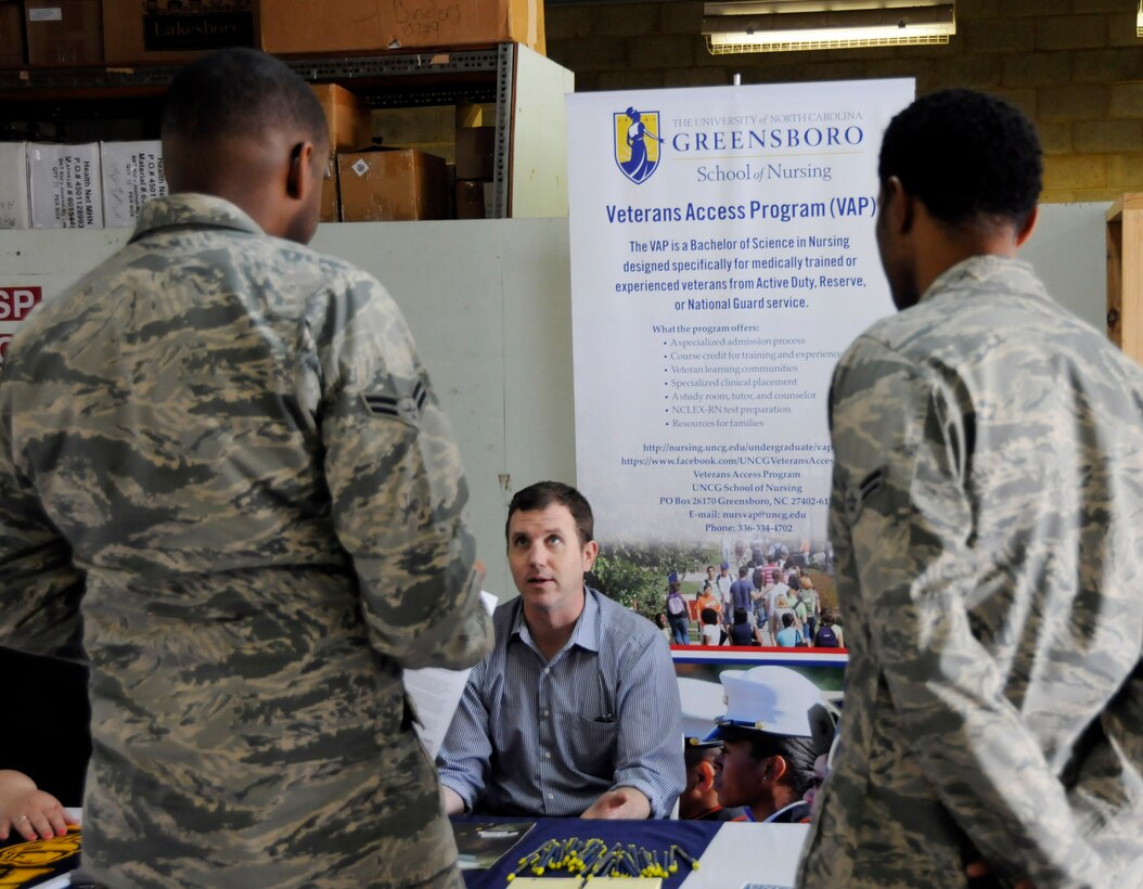 Members of the 145th Airlift Wing took part in the annual Educational Fair held at the North Carolina Air National Guard base, Charlotte Douglas Intl. Airport, April 18, 2015.  University of North Carolina System, a multi-campus university composed of all 16 of North Carolina’s local and state institutions, came to showcase programs they offer to veterans including baccalaureate, masters and doctoral degrees. More than 45 airmen visited representatives participating in this year’s event. (U.S. Air National Guard photo by Master Sgt. Patricia F. Moran, 145th Public Affairs/Released)