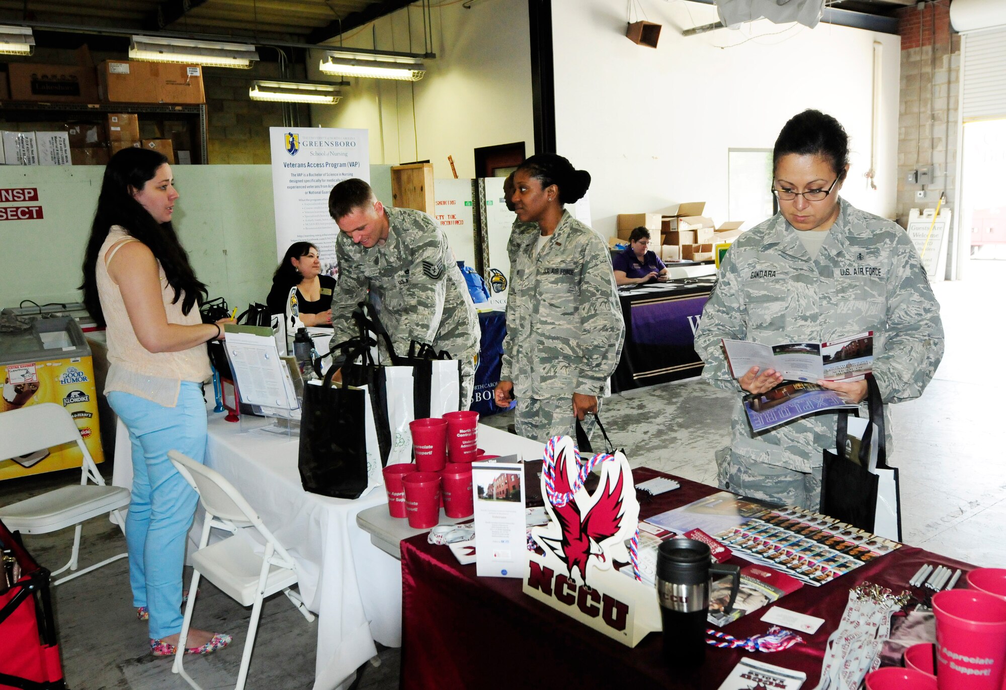 Members of the 145th Airlift Wing took part in the annual Educational Fair held at the North Carolina Air National Guard base, Charlotte Douglas Intl. Airport, April 18, 2015.  University of North Carolina System, a multi-campus university composed of all 16 of North Carolina’s local and state institutions, came to showcase programs they offer to veterans including baccalaureate, masters and doctoral degrees. More than 45 airmen visited representatives participating in the event. (U.S. Air National Guard photo by Master Sgt. Patricia F. Moran, 145th Public Affairs/Released)