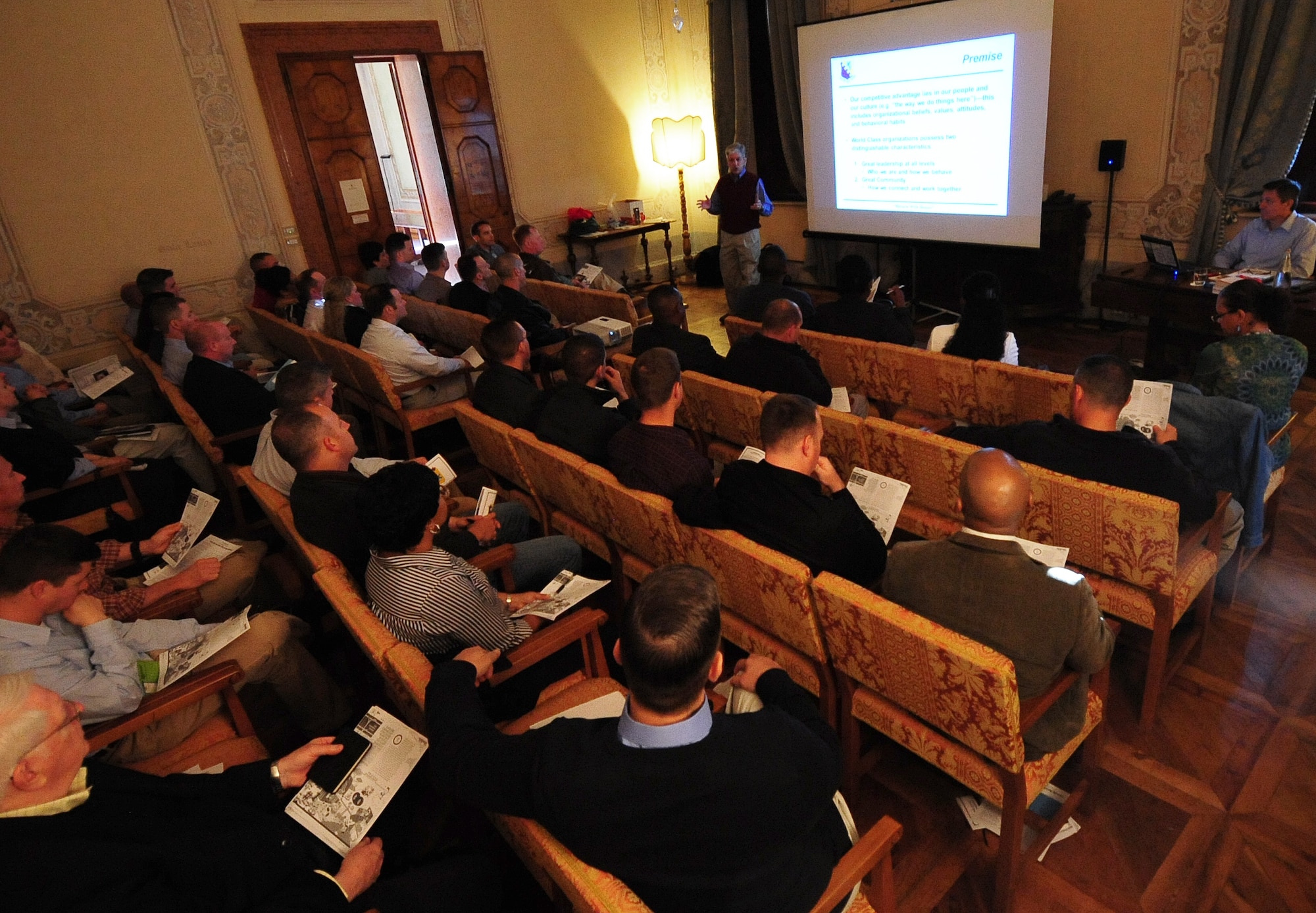 U.S. Air Force Brig. Gen. Barre Seguin, 31st Fighter Wing commander, speaks with Aviano leadership during a professionalism seminar, April 20, 2015. The seminar led by Col. Jeffrey Smith, Air Force Profession of Arms Center of Excellence director, spoke about the importance of understanding human psychology and how to develop environments that encourage increased levels of commitment, loyalty and trust. (U.S. Air Force photo by Senior Airman Matthew Lotz/Unreleased)