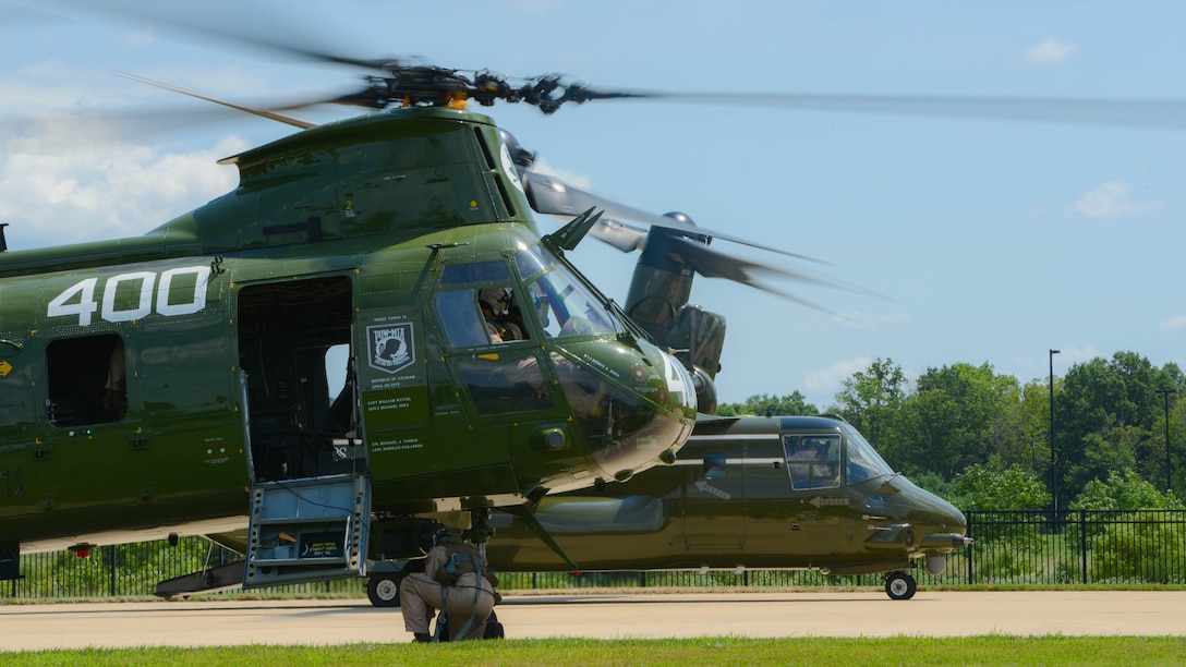 A Marine with Marine Medium Helicopter Squadron 774 locks the wheels of the Boeing Vertol CH-46 Sea Knight in place, Aug. 1, 2015 before the CH-46 Last Flight Retirement Ceremony at the Smithsonian Institution Nation Air and Space Museum Steven F. Udvar-Hazy Center in Chantilly, Virginia. The CH-46’s main mission has been to provide combat support, however, the aircraft also flew resupply missions, medical evacuations and tactical recovery of aircraft and personnel. 