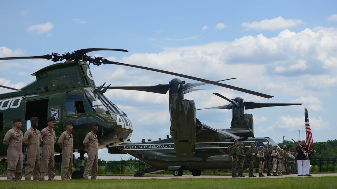 Marines with Marine Medium Helicopter Squadron 774 and Marines from Marine Helicopter Squadron One stand ready for the playing of the Star Spangled Banner Aug. 1, 2015 during the CH-46 Last Flight Retirement Ceremony at the Smithsonian Institution Nation Air and Space Museum Steven F. Udvar-Hazy Center in Chantilly, Virginia. The CH-46’s main mission has been to provide combat support, however, the aircraft also flew resupply missions, medical evacuations and tactical recovery of aircraft and personnel. 