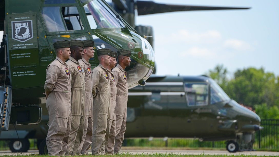 Marines with Marine Medium Helicopter Squadron 774 stand ready for the playing of Anchors Aweigh and the Marines Hymn Aug. 1, 2015 during the CH-46 Last Flight Retirement Ceremony at the Smithsonian Institution Nation Air and Space Museum Steven F. Udvar-Hazy Center in Chantilly, Virginia. The CH-46’s main mission has been to provide combat support, however, the aircraft also flew resupply missions, medical evacuations and tactical recovery of aircraft and personnel. 