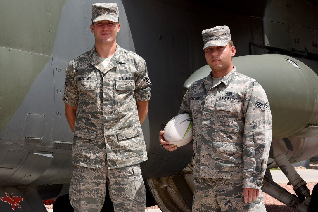 Senior Airman Benjamin A. Haapapuro, a space systems maintainer, and Senior Airman Theodore J. Szarzynski, a space warning specialist, both assigned to the 233d Space Group in Greeley, Colo. are members of the official Air Force Rugby team that will compete in the Armed Forces Rugby Championship August 14-15 at Infinity Park, Glendale, Colo. (US Air National Guard Photo by SrA Michelle Alvarez-Rea)