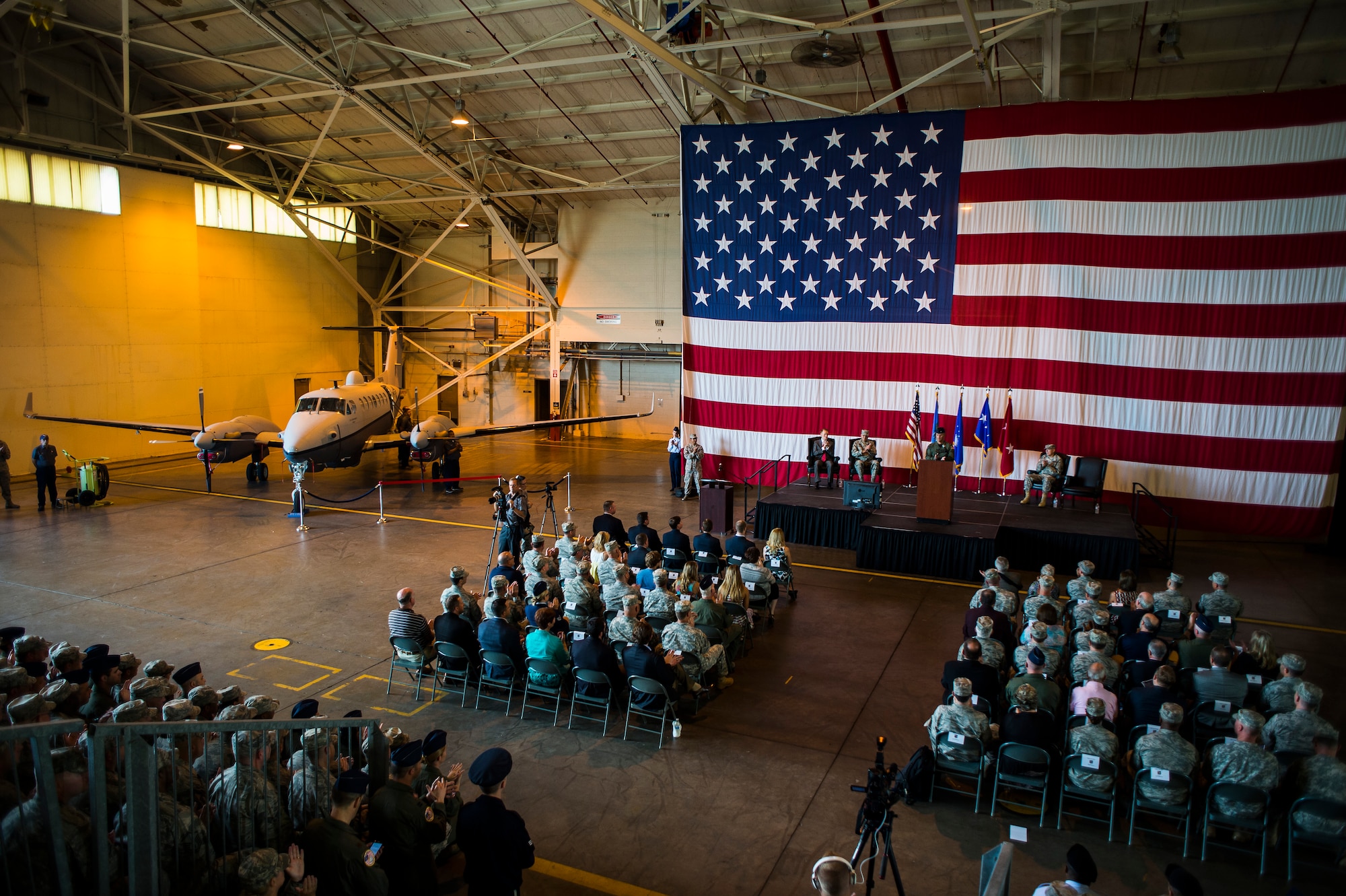 Col. Devin Wooden, 137th Air Refueling Wing commander, addresses members of the 137 ARW during a ceremony Saturday, Aug. 1, 2015, at Will Rogers Air National Guard Base, Okla. The Oklahoma guard unit begins the transition to the Air Force Special Operations Command. (U.S. Air National Guard photo by Senior Airman Tyler Woodward/ Released) 