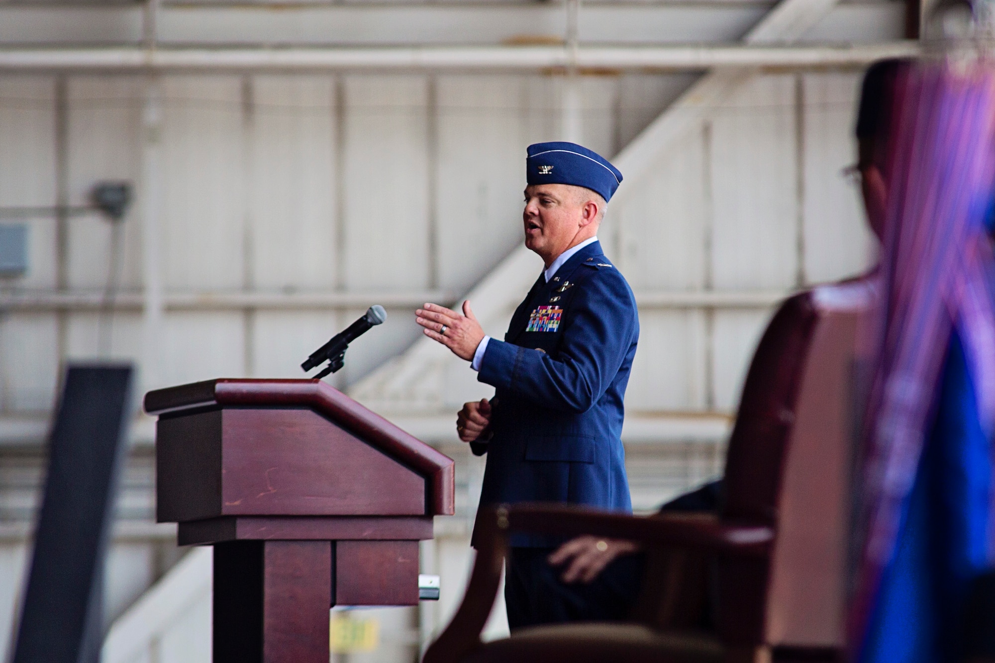 Col. D. Scott Durham, incoming 512th Airlift Wing commander, publicly thanks his family during the 512th Airlift Wing change of command ceremony Aug. 1, 2015, on Dover Air Force Base, for the support they have given. Durham’s previous assignment was at the Pentagon, where he served as the deputy director for mobilization in the Office of the Assistant Secretary of Defense for Reserve Affairs. (U.S. Air Force photo by Capt. Bernie Kale)