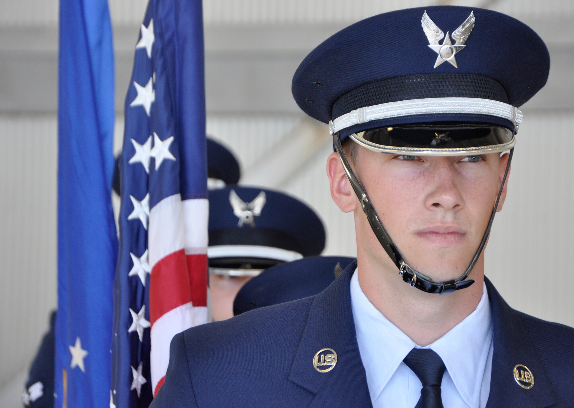 Members of the 446th Airlift Wing Honor Guard stand ready to present the colors during the 446th Maintenance Group change of command ceremony at Joint Base Lewis-McChord, Wash., Aug. 1, 2015. Col. Kirk Peddicord took commander of the 446th MXG from outgoing commander, Col. Alan Lerner. Peddicord's previous assignment was at Headquarters, Air Mobility Command. Lerner, who arrived at the 446th MXG in September 2011, retired from the Air Force Reserve. (U.S. Air Force photo/2nd Lt. Stephen J. Collier)