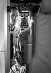 Col. William Lyons, the 10th Air Force vice commander, talks with a Combat Aviation Advisor aboard a C-145 during an orientation to the CAA mission at Duke Field, Fla., Aug. 1, 2015.  Duke Field's Air Force Reserve and active-duty CAAs deploy to partner nations to train personnel to engage in air operations. (U.S. Air Force photo/Tech. Sgt. Jasmin Taylor)