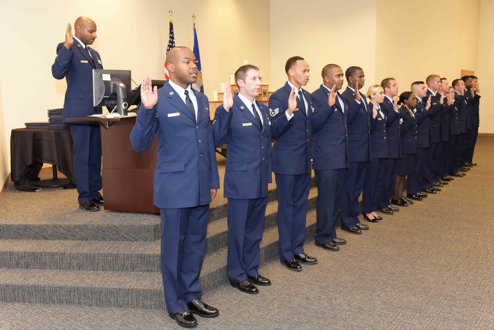 Fifteen new staff sergeants were inducted during a ceremony held Aug. 1, 2015, in the 403rd Wing Roberts Consolidated Aircraft Maintenance Facility at Keesler Air Force Base, Mississippi. The ceremony is a time-honored tradition welcoming Air Force Airmen into the responsibilities of their new positions. (U.S. Air Force photo/Tech. Sgt. Ryan Labadens)