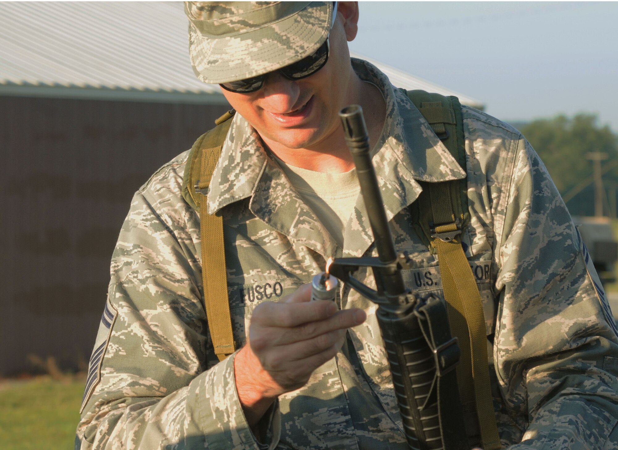Master Sgt. Christopher Fusco, 111th Operations Support Squadron member with the 111th Attack Wing at Horsham Air Guard Station, Pennsylvania, prepares his rifle before the Governor’s Twenty marksmanship competition held July 25, 2015, Fort Indiantown Gap, Pennsylvania. Fusco placed third out of 82 contestants in the annual National Guard event. (U.S. Air National Guard submitted photo/Released)