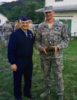 Brig. Gen. Tony Carrelli, Deputy Adjutant General – Air, Pennsylvania National Guard, poses for a photo with Master Sgt. Christopher Fusco, 111th Operations Support Squadron member with the 111th Attack Wing at Horsham Air Guard Station, Pennsylvania, after Fusco’s third-place finish at the Governor’s Twenty marksmanship competition held July 25, 2015, Fort Indiantown Gap, Pennsylvania.  This marks the first time in six year since the 111th Attack Wing, formerly the 111th Fighter Wing, presented a team to compete in the annual National Guard event. (U.S. Air National Guard submitted photo/Released)