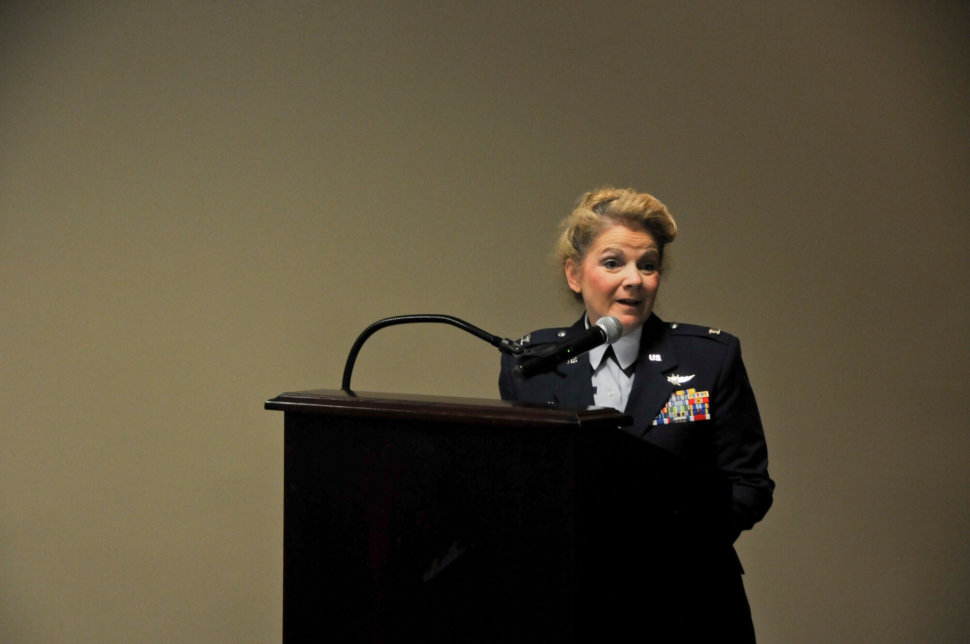 Col. Tenise Gardner, 188th Mission Support Group commander, speaks about the credentials of Maj. Micheal Howard at Ebbing Air National Guard Base, Fort Smith, Ark., during Howard’s assumption of command of the 188th Civil Engineer Squadron Aug. 1, 2015. As the 188th MSG commander, Gardner leads the 188th CES, 188th Security Forces Squadron, 188th Force Support Squadron, 188th Logistics Readiness Squadron and the 188th Communications Flight. (U.S. Air National Guard photo by Senior Airman Cody Martin/Released)